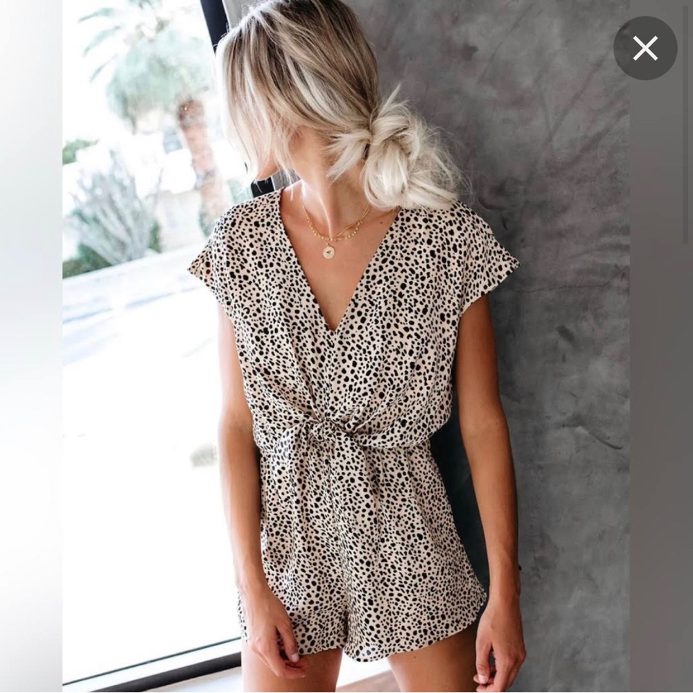 Vici romper with open back.